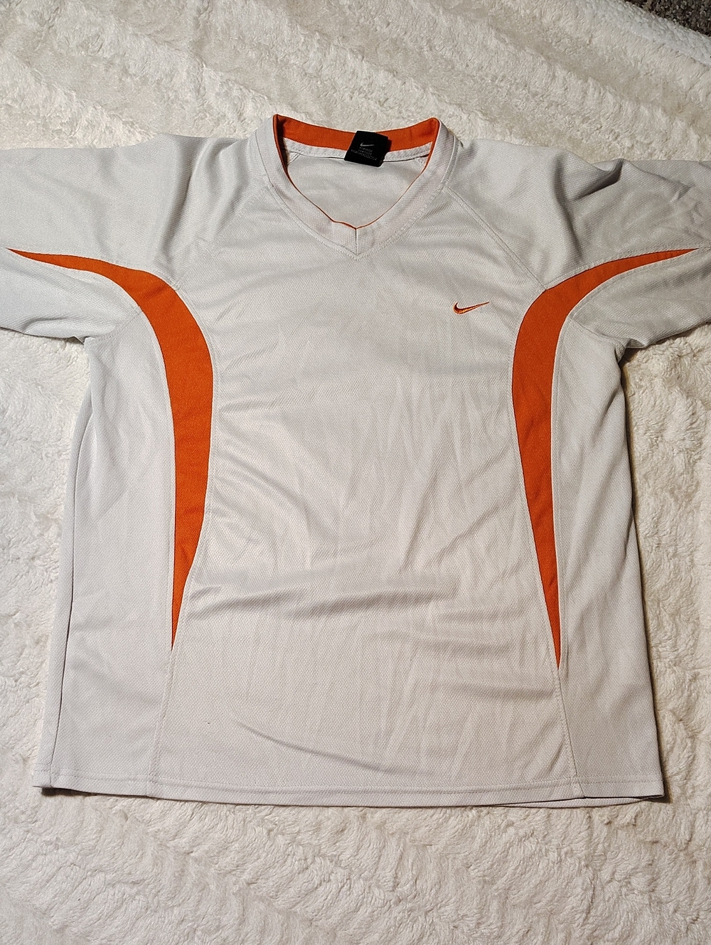 Nike Women's White Athletic V-Neck Shirt with Orange Accents